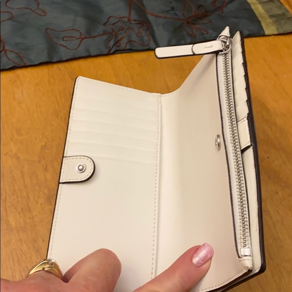 A silver Kate spade wallet! Lightly used. - Picture 2 of 3